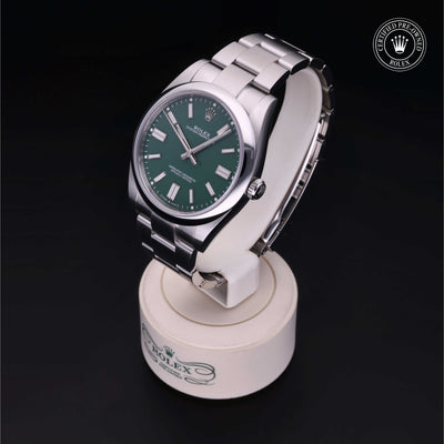 Rolex Certified Pre-owned Oyster Perpetual M124300-0005 front on black background