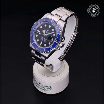 Rolex Certified Pre-owned Submariner M126619LB-0003 front on black background