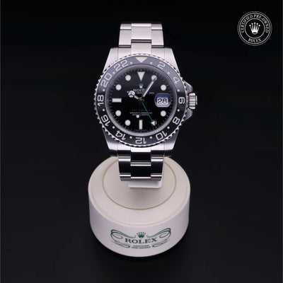 Rolex Certified Pre-owned GMT M116710LN-0001 front on black background