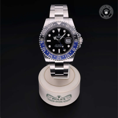 Rolex Certified Pre-owned GMT II M116710BLNR-0002 front on black background