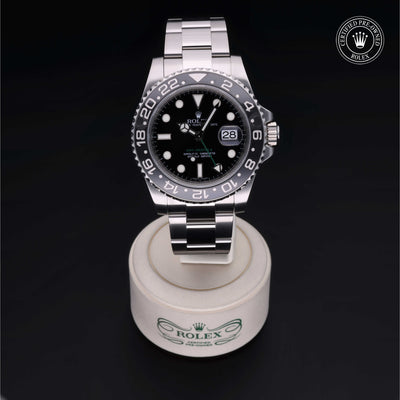 Rolex Certified Pre-owned GMT M116710LN-0001 front on black background