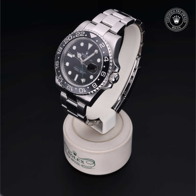 Rolex Certified Pre-owned GMT M116710LN-0001 front on black background