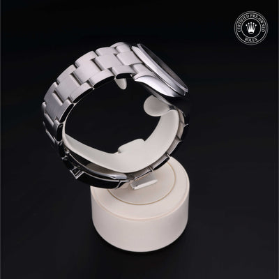 Rolex Certified Pre-owned Oyster Perpetual M126000-0005 front on black background