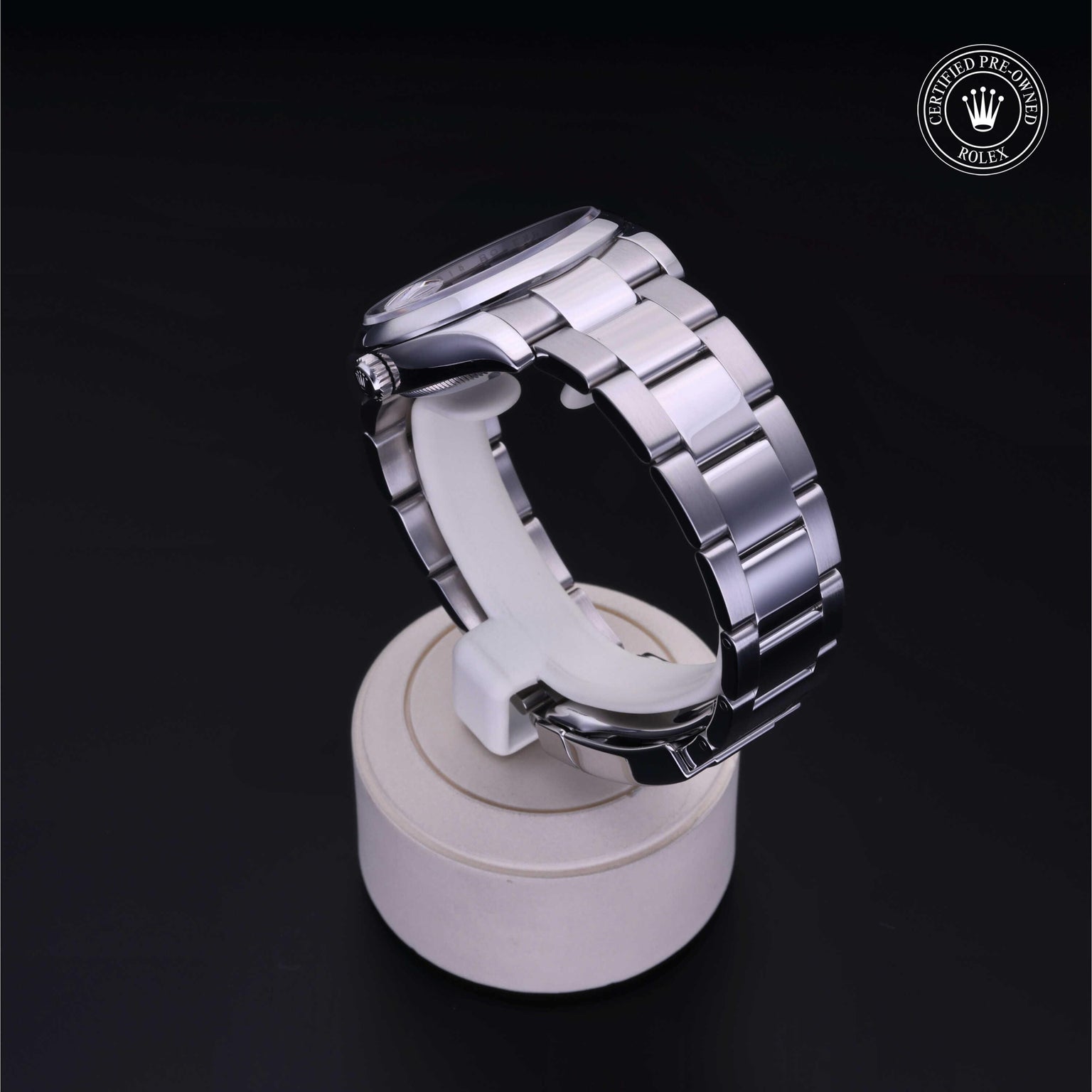 Rolex Certified Pre-owned Oyster Perpetual M115200-0004 front on black background