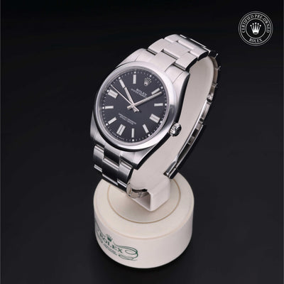 Rolex CPO Oyster Perpetual M124300 front on white background