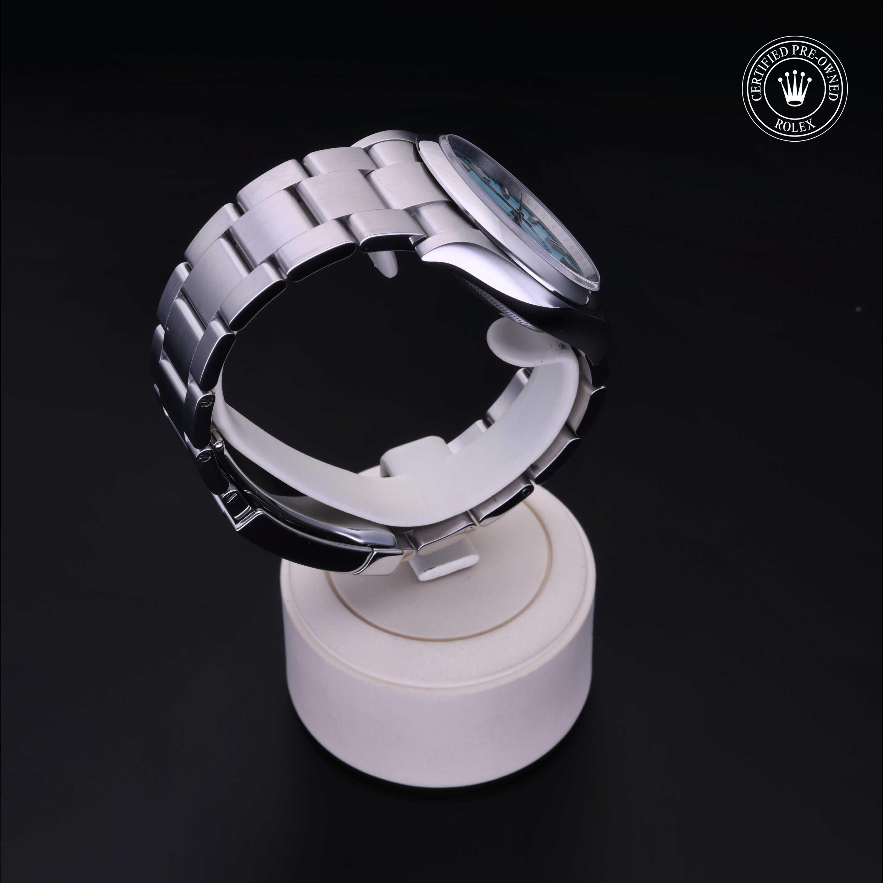 Rolex CPO Oyster Perpetual M126000 front on white background