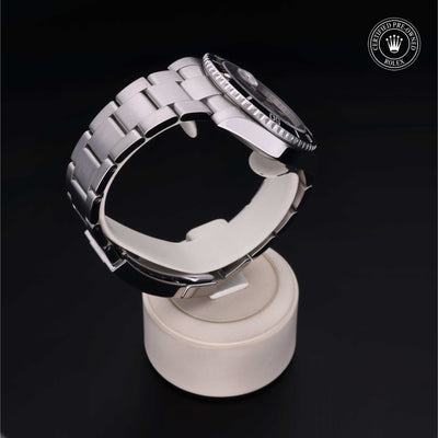 Rolex Certified Pre-owned Submariner M116610LN-0001 front on black background