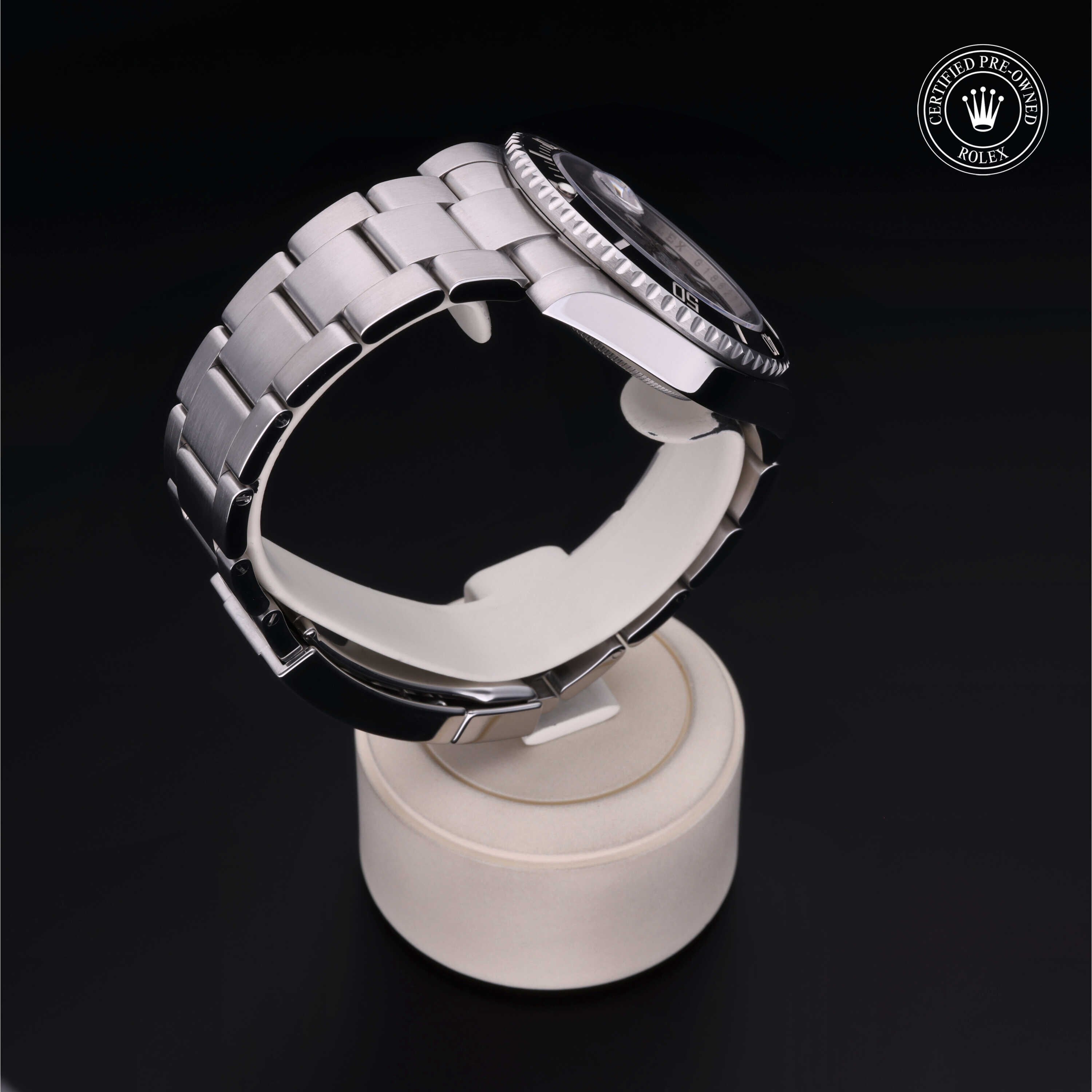 Rolex Certified Pre-owned Submariner M116610LN-0001 front on black background