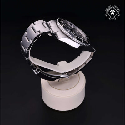 Rolex Certified Pre-owned Submariner M116610LN-0001 front on black background