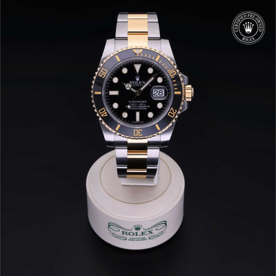 Rolex Certified Pre-owned Submariner M116613LN-0001 front on black background