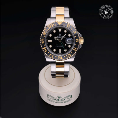 Rolex Certified Pre-owned GMT M116713LN-0001 front on black background