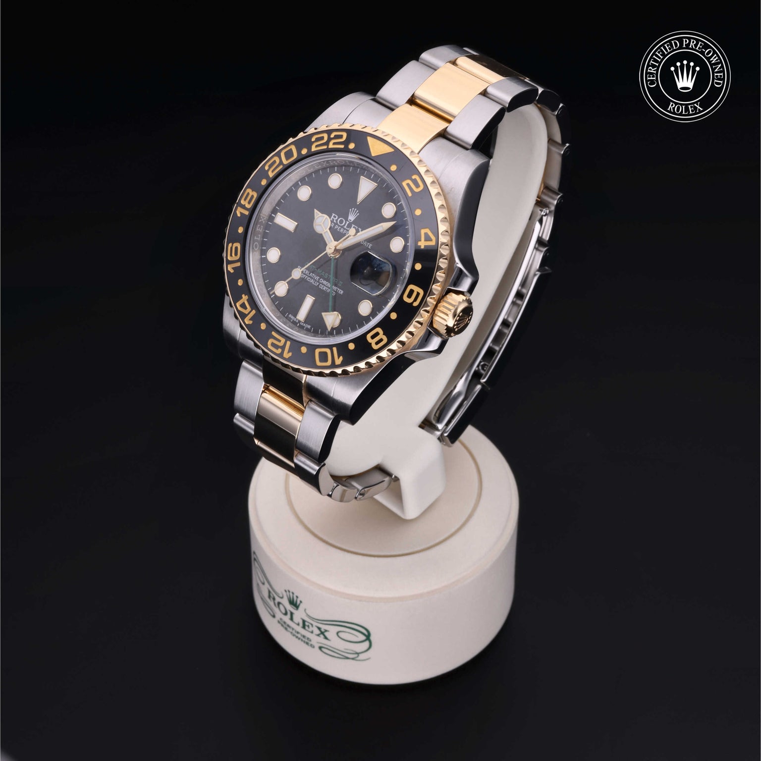 Rolex Certified Pre-owned GMT M116713LN-0001 front on black background