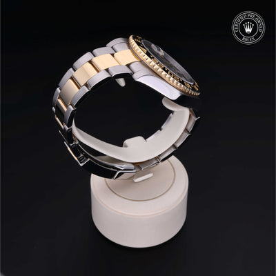 Rolex Certified Pre-owned GMT M116713LN-0001 front on black background
