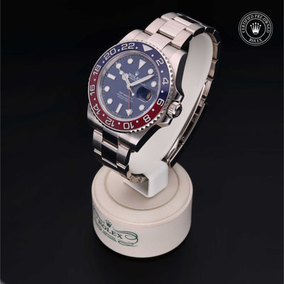 Rolex Certified Pre-owned GMT M126719BLRO-0003 front on black background