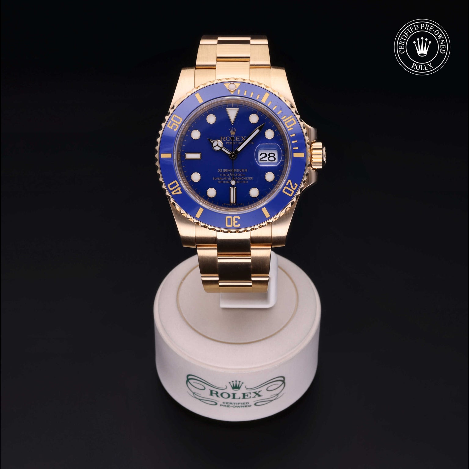 Rolex Certified Pre-owned Submariner M116618LB-0003 front on black background