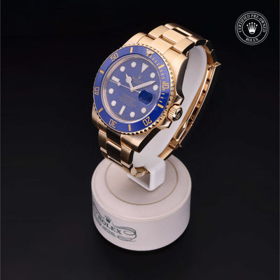 Rolex Certified Pre-owned Submariner M116618LB-0003 front on black background
