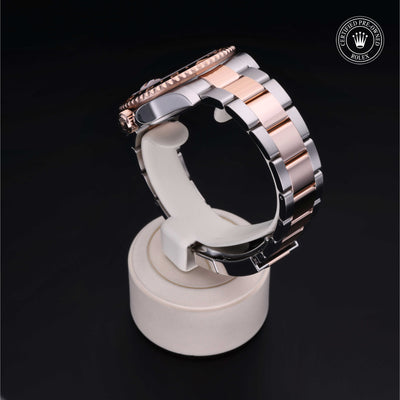 Rolex Certified Pre-owned GMT M126711CHNR-0002 front on black background