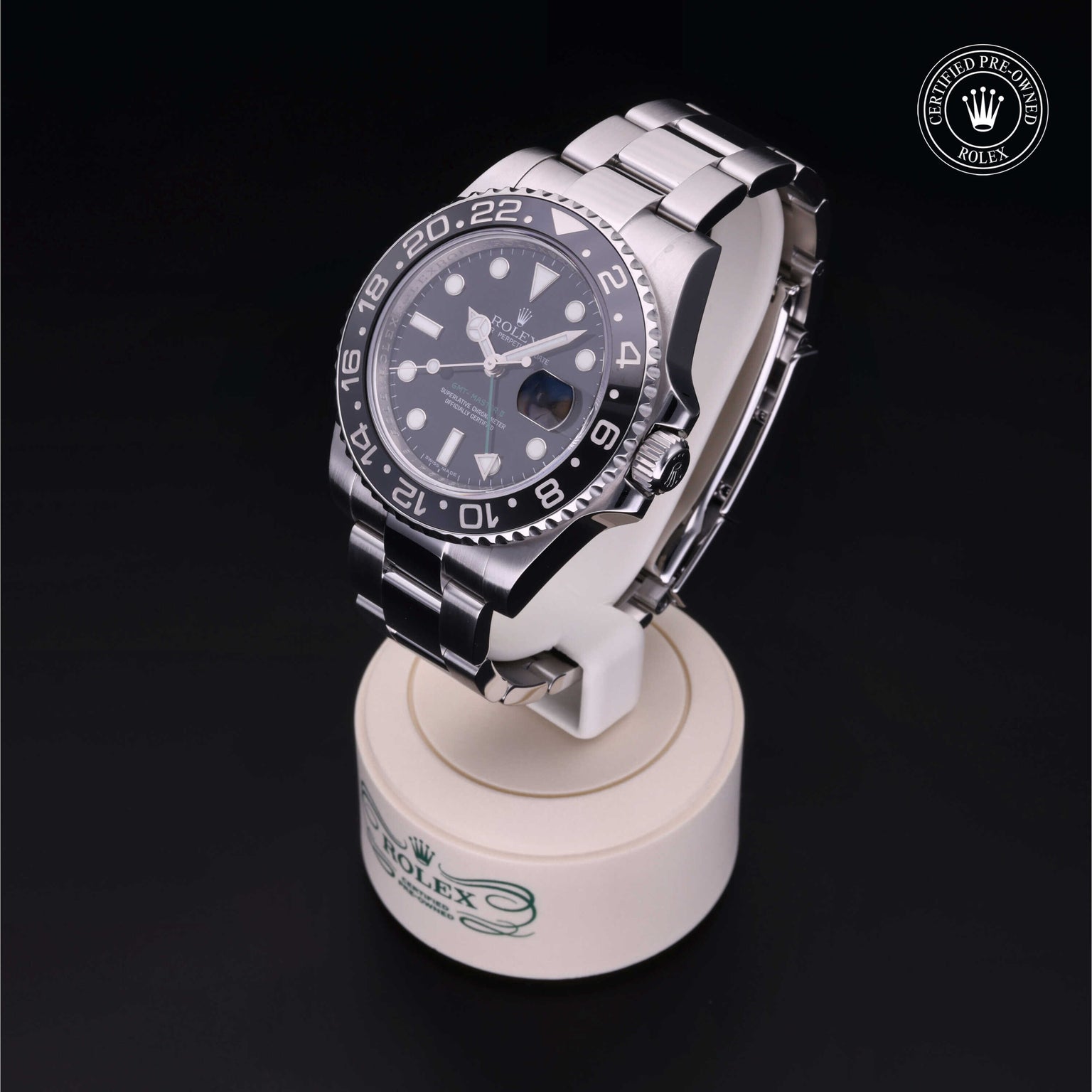 Rolex Certified Pre-owned GMT M116710LN-0001 front on black background