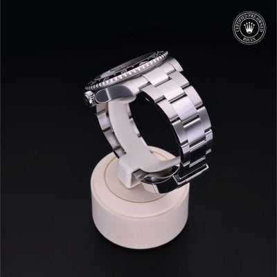 Rolex Certified Pre-owned GMT M116710LN-0001 front on black background