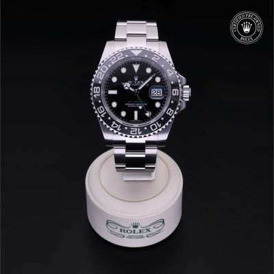 Rolex Certified Pre-owned GMT M116710LN-0001 front on black background