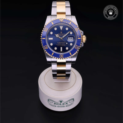 Rolex Certified Pre-owned Submariner M116613LB-0005 front on black background