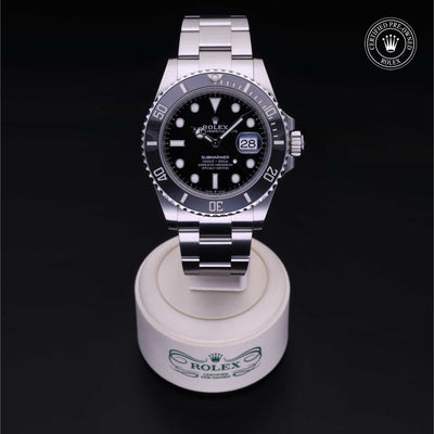 Rolex Certified Pre-owned Submariner M126610LN-0001 front on black background