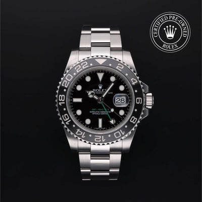 Rolex Certified Pre-owned GMT M116710LN-0001 front on black background