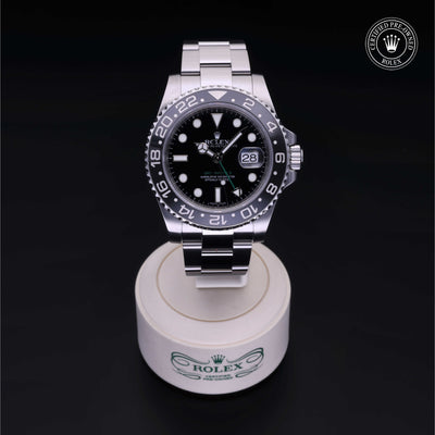 Rolex Certified Pre-owned GMT M116710LN-0001 front on black background
