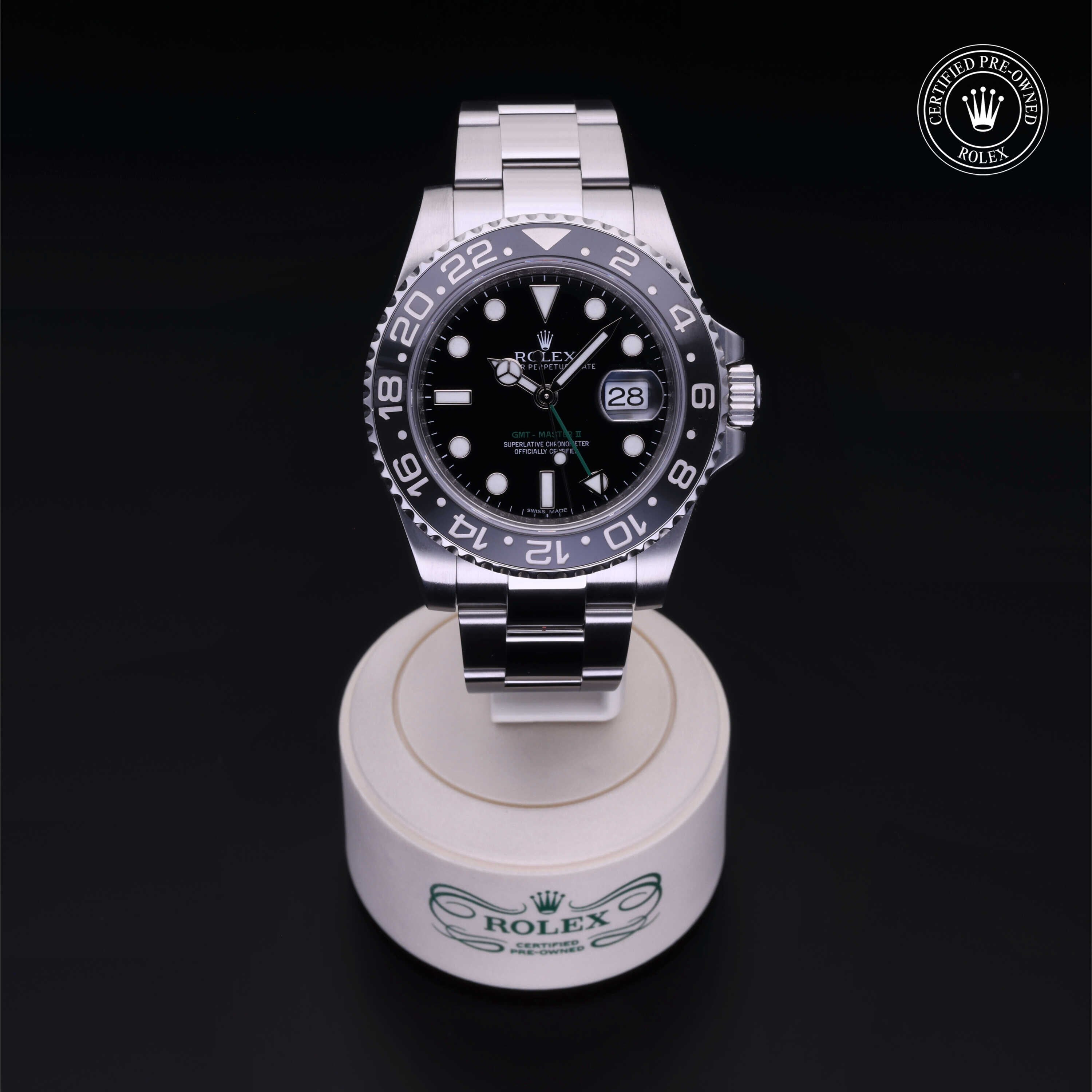 Rolex Certified Pre-owned GMT M116710LN-0001 front on black background