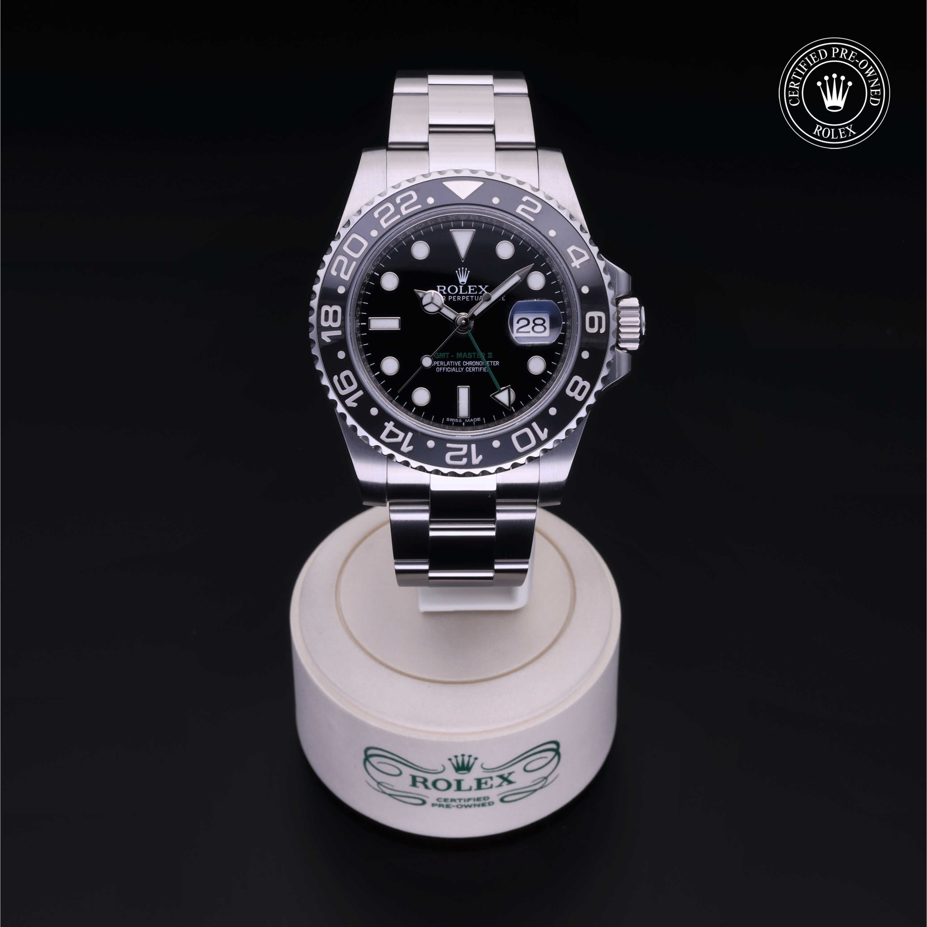 Rolex Certified Pre-owned GMT M116710LN-0001 front on black background