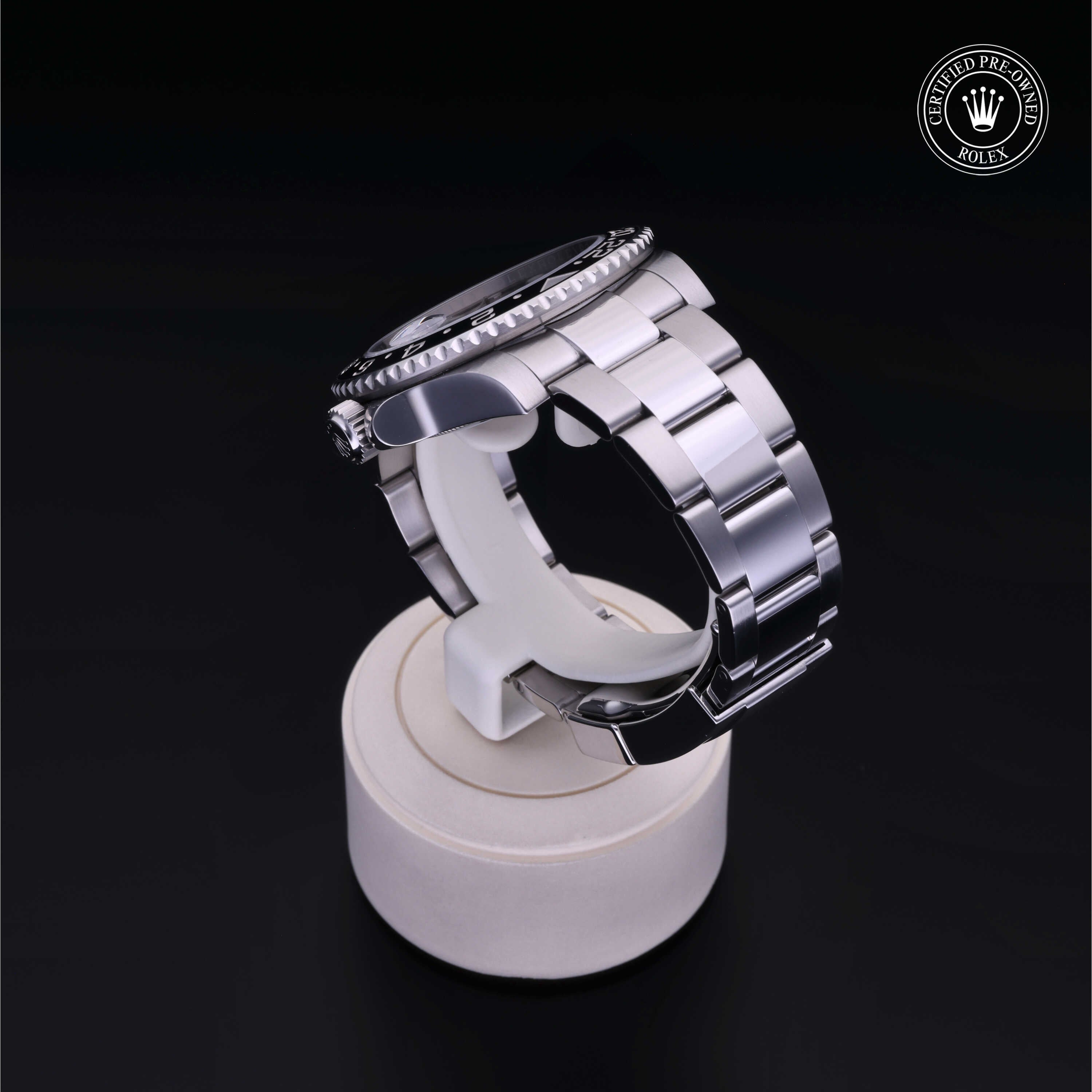 Rolex Certified Pre-owned GMT M116710LN-0001 front on black background