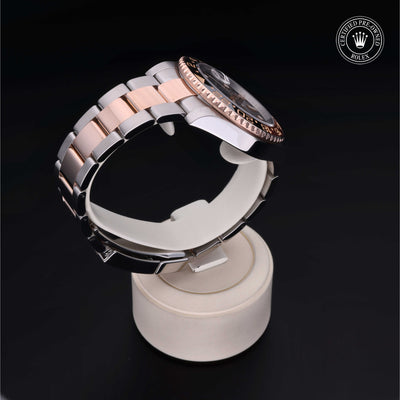 Rolex Certified Pre-owned GMT M126711CHNR-0002 front on black background