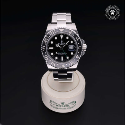 Rolex Certified Pre-owned GMT M116710LN-0001 front on black background