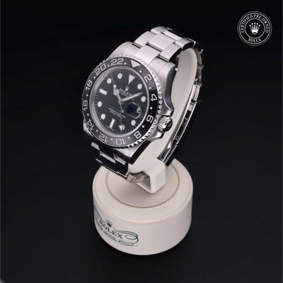 Rolex Certified Pre-owned GMT M116710LN-0001 front on black background