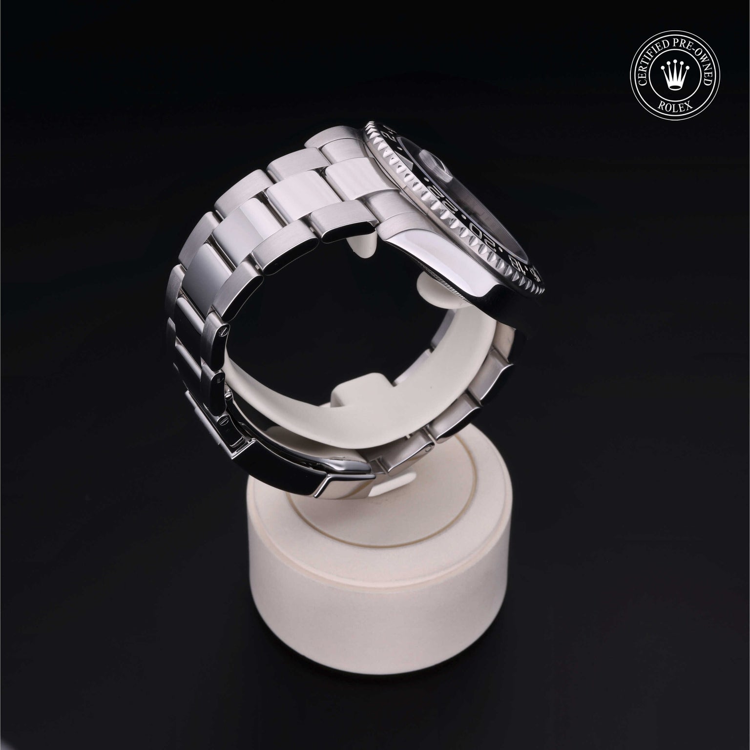 Rolex Certified Pre-owned GMT M116710LN-0001 front on black background