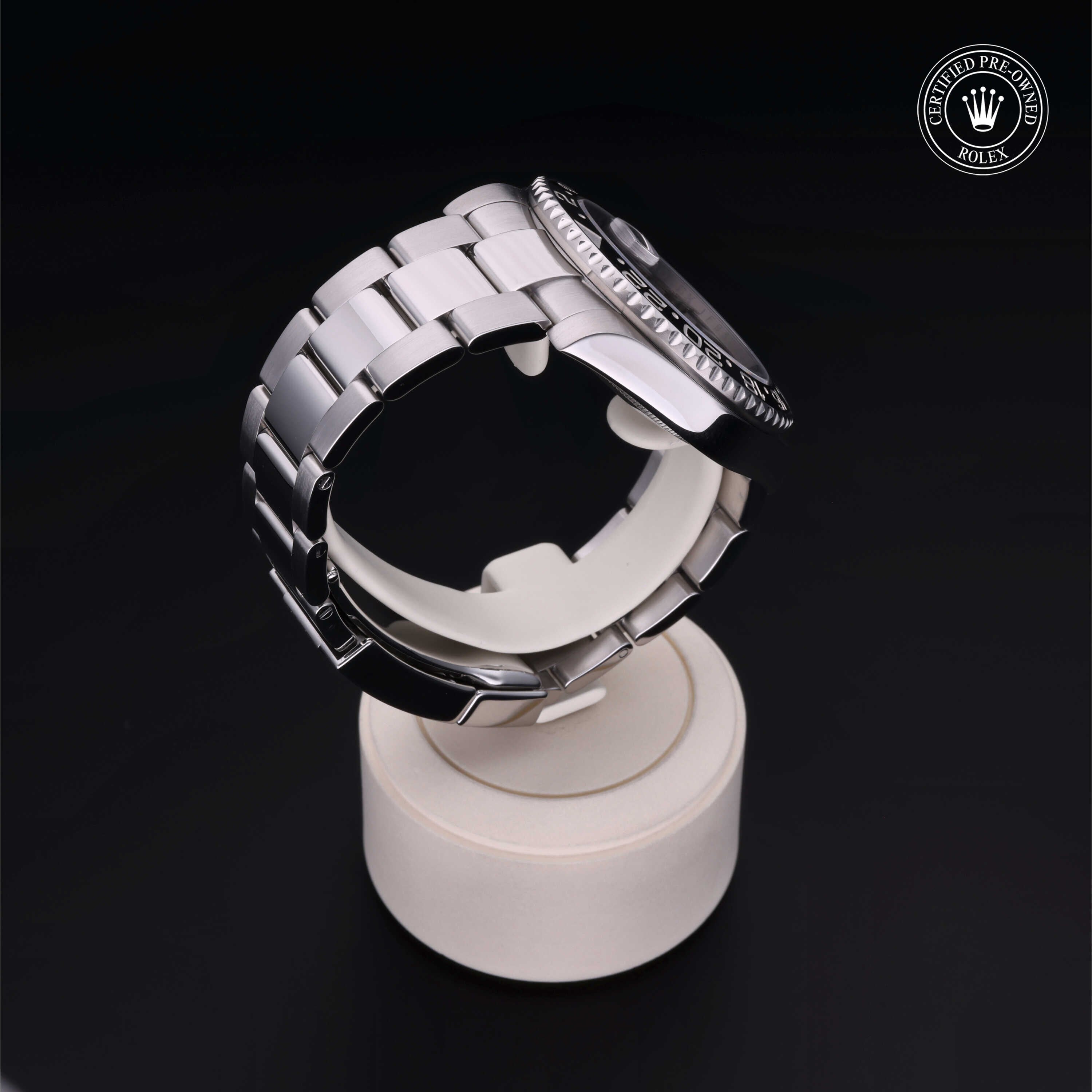 Rolex Certified Pre-owned GMT M116710LN-0001 front on black background