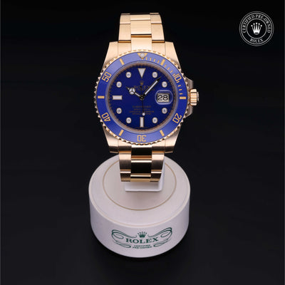 Rolex Certified Pre-owned Submariner M116618LB-0002 front on black background
