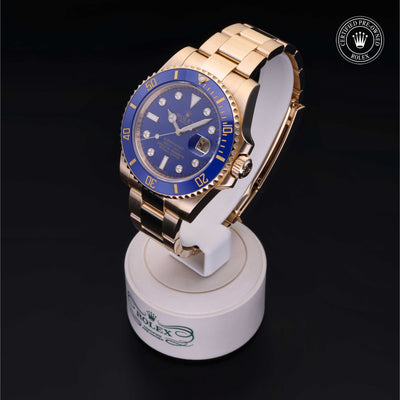 Rolex Certified Pre-owned Submariner M116618LB-0002 front on black background