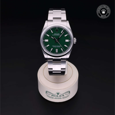 Rolex CPO Oyster Perpetual M126000 front on white background