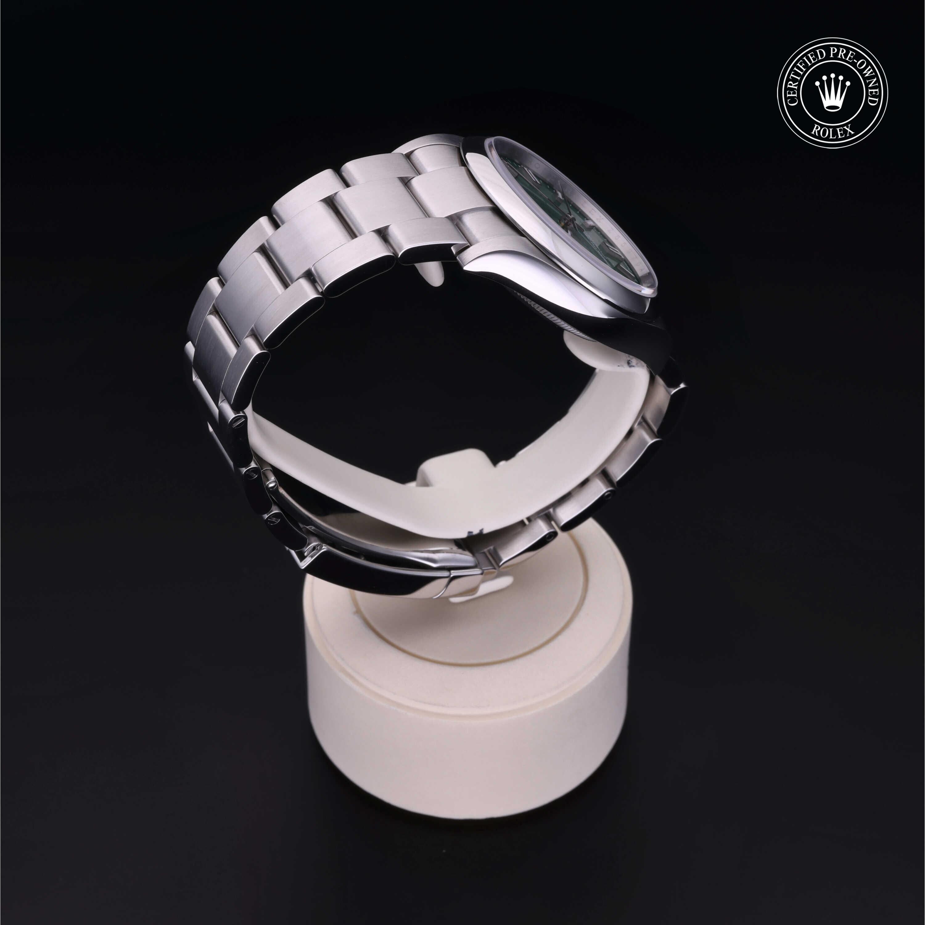 Rolex CPO Oyster Perpetual M126000 front on white background