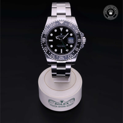 Rolex Certified Pre-owned GMT M116710LN-0001 front on black background