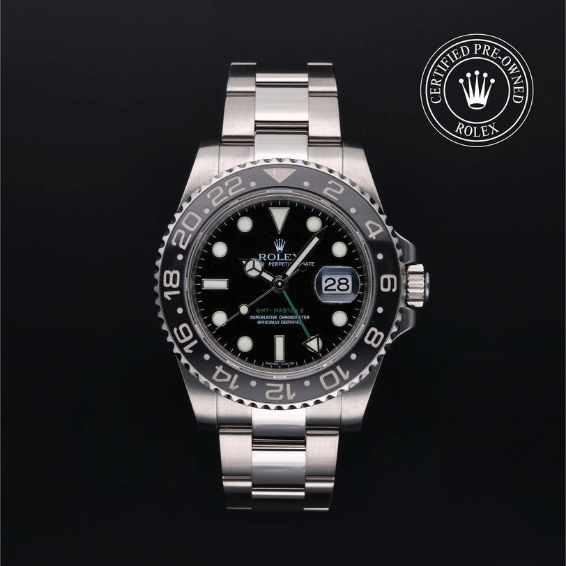 Rolex Certified Pre-owned GMT M116710LN-0001 front on black background