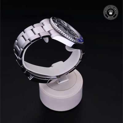 Rolex Certified Pre-owned GMT M126710BLNR-0003 front on black background