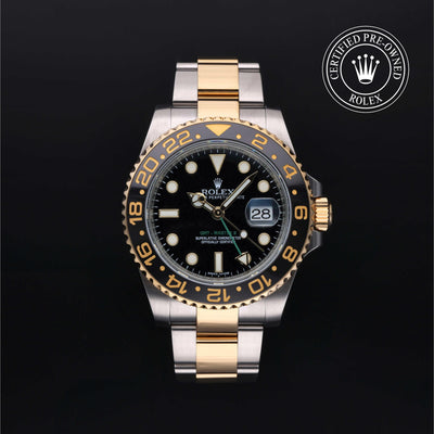 Rolex Certified Pre-owned GMT M116713LN-0001 front on black background
