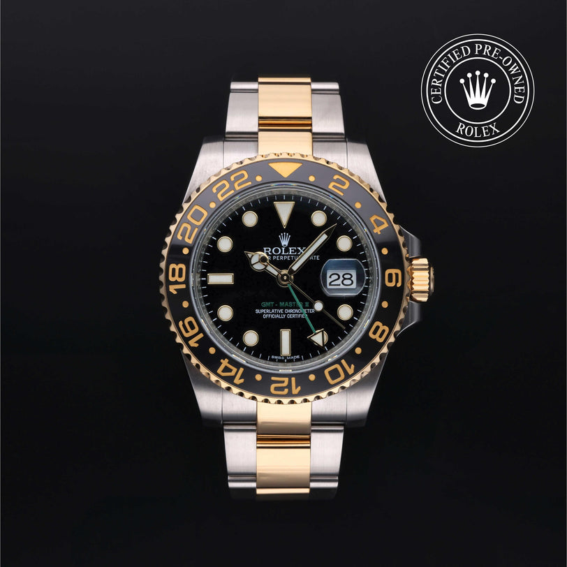 Rolex Certified Pre-owned GMT M116713LN-0001 front on black background