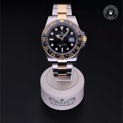 Rolex Certified Pre-owned GMT M116713LN-0001 front on black background