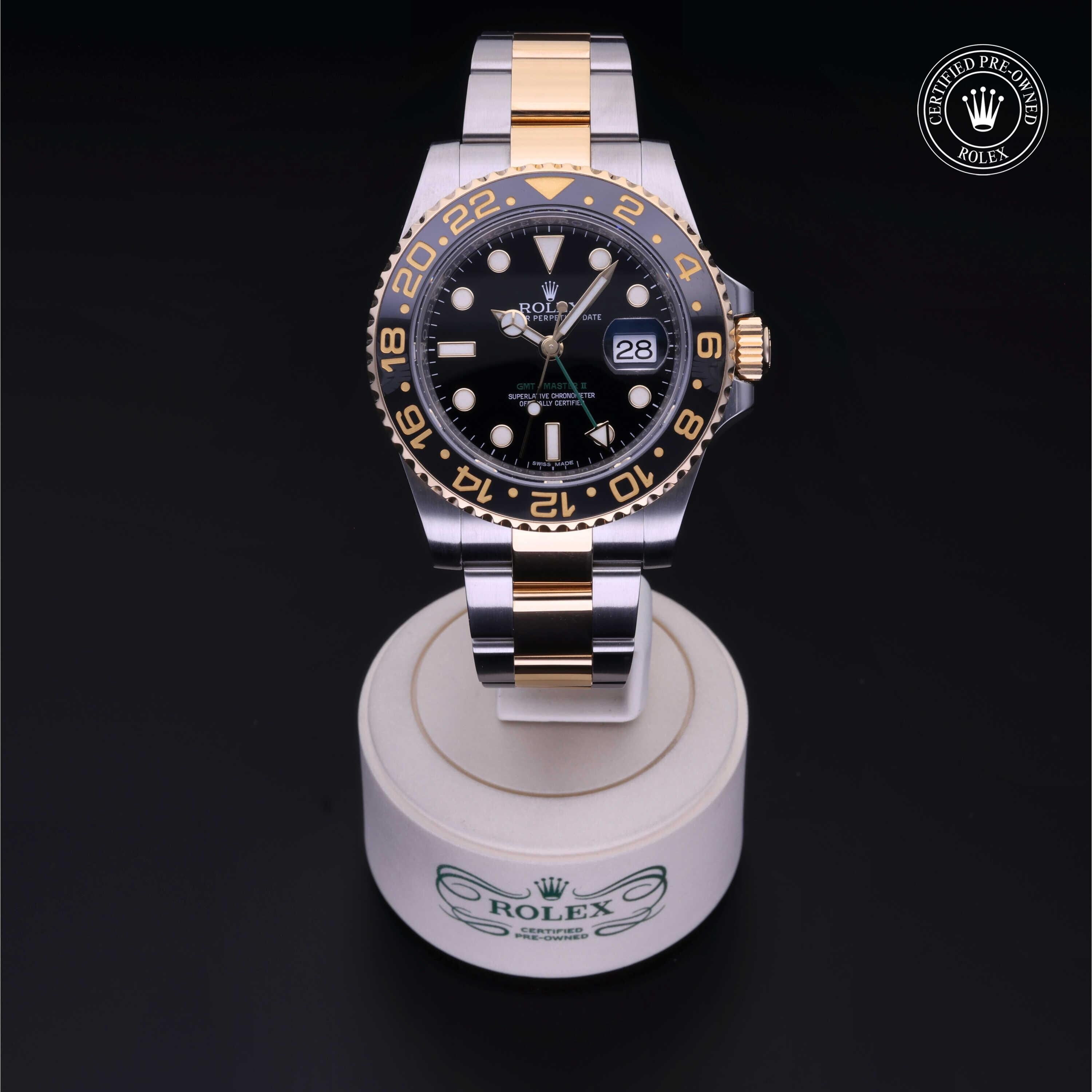 Rolex Certified Pre-owned GMT M116713LN-0001 front on black background