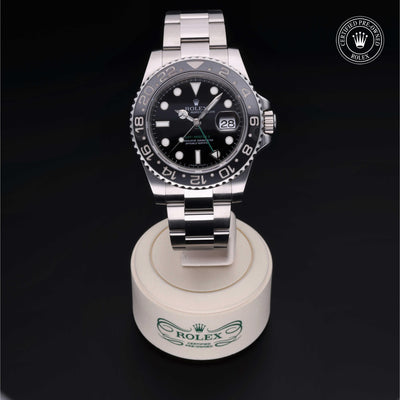 Rolex Certified Pre-owned GMT M116710LN-0001 front on black background