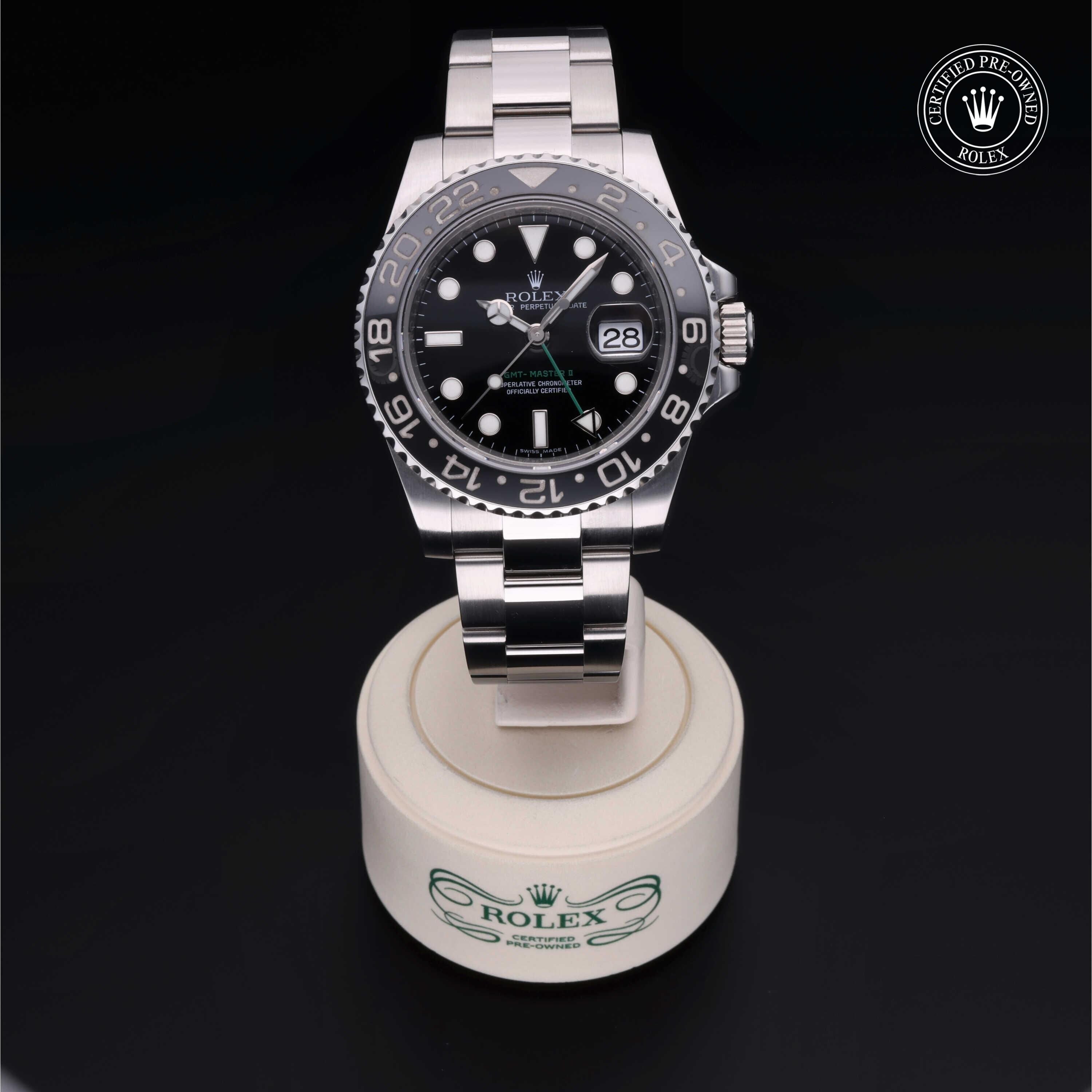 Rolex Certified Pre-owned GMT M116710LN-0001 front on black background