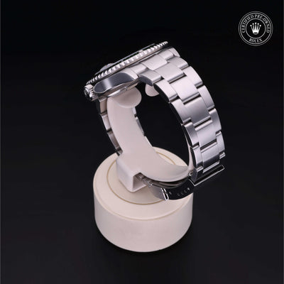 Rolex Certified Pre-owned Submariner M16610LV-0002 front on black background
